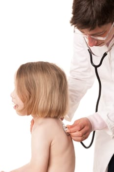 Toddler at pediatrician in front of white background