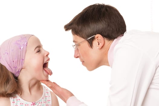 Toddler at pediatrician in front of white background