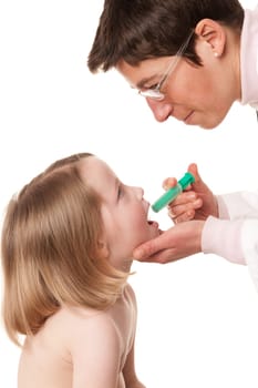 Toddler at pediatrician in front of white background