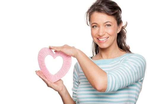Woman with a pink heart against a white background