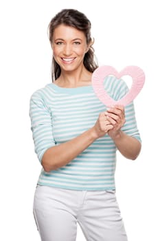 Woman with a pink heart against a white background