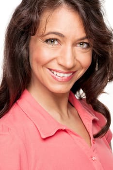 Young and smiling woman in front of white background