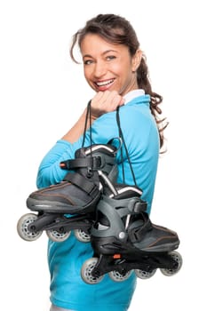 Sporty woman with inline skates in front of white background