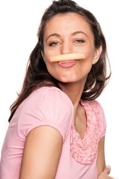 Smiling woman with a biscuit against a white background