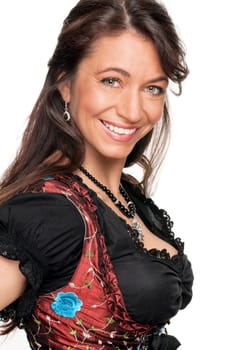 Happy woman with a traditional costume against a white background