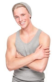 Smiling young man in front of white background