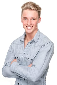 Smiling young man in front of white background