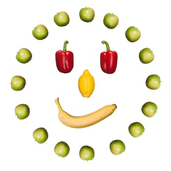 Fresh fruits and vegetables against white background