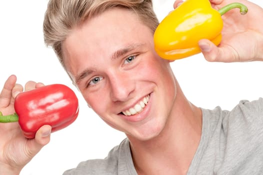 Young and smiling man with pepper