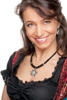 Happy woman with a traditional costume against a white background