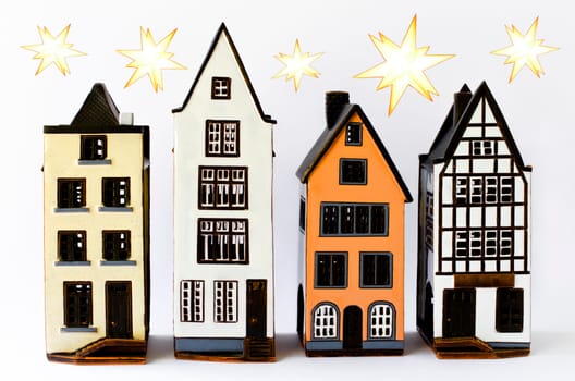 Colourful Christmas houses and poinsettias