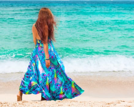 Woman walking near the sea
