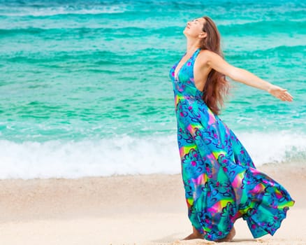 Woman walking near the sea