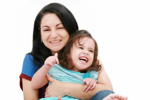 Closeup of happy young mother having fun with her daughter