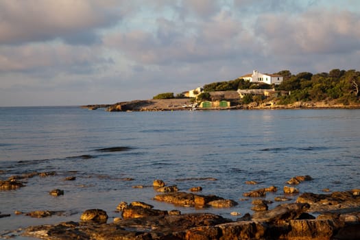Bay with house and boat shed