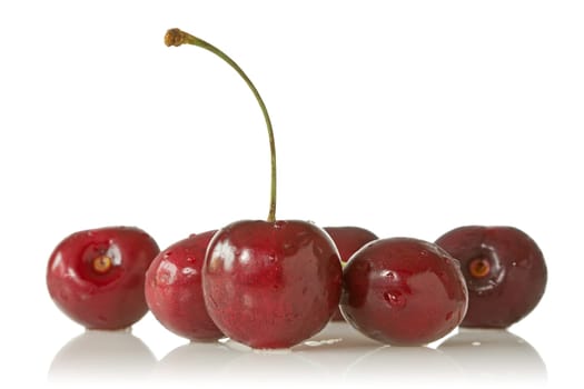 ripe juicy cherries on a white background
