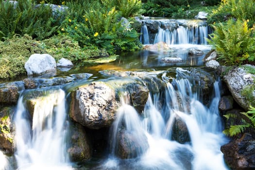 Japanese garden with waterfall,free time in beautiful nature