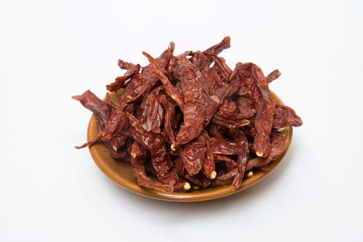 Hot, spicy, pungent, red chillies used to garnish during cooking