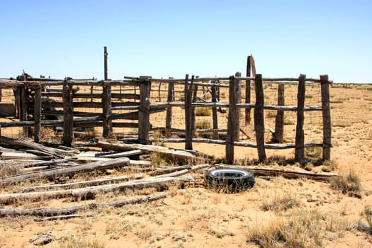 Wood and car tires in the desert