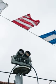 The ship field-glass and alarm flags