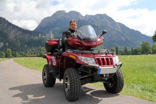 With the quad bike in front of Neuschwanstein Castle