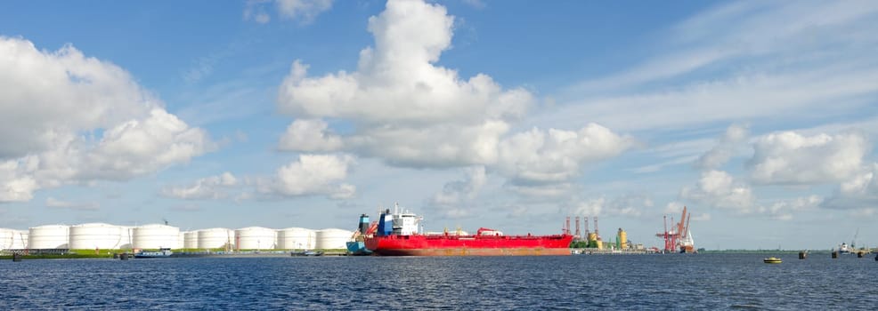 panoramic view of chemical tankers in amsterdam harbor