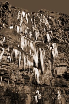 icicles on a cliff face in ballybunion ireland on a winters day
