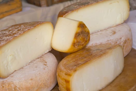 Different sorts of cheese at a farmer's market.(Provence, France)