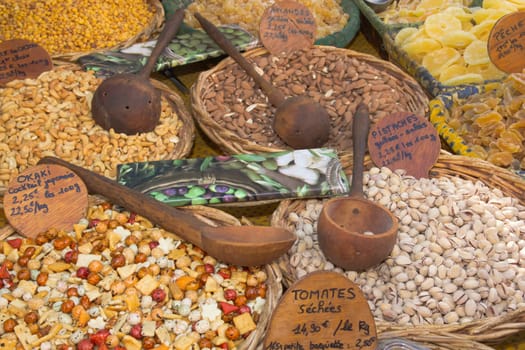 Various kinds of nuts prepared to sell at a farmer's market.(Provence, France)
