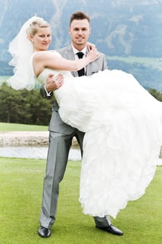 Pretty bride and groom celebrate their wedding