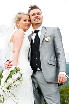 Pretty bride and groom celebrate their wedding
