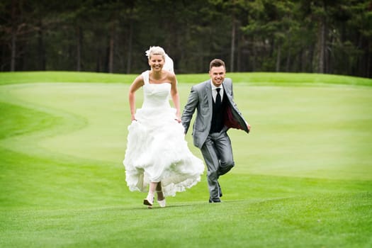 Pretty bride and groom celebrate their wedding