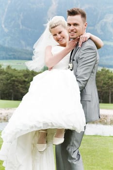 Pretty bride and groom celebrate their wedding