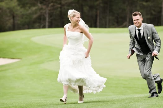 Pretty bride and groom celebrate their wedding