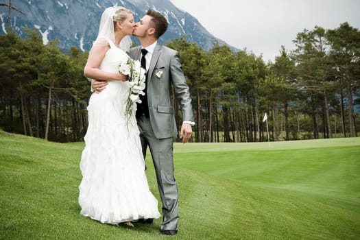 Pretty bride and groom celebrate their wedding