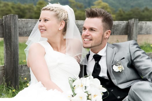 Pretty bride and groom celebrate their wedding