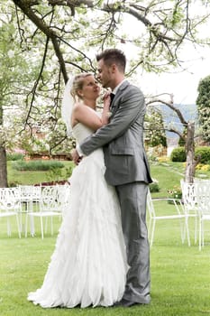 Pretty bride and groom celebrate their wedding