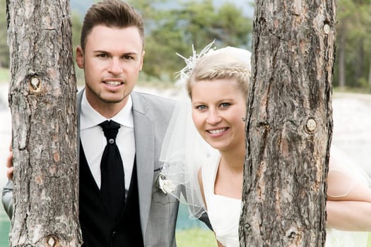 Pretty bride and groom celebrate their wedding
