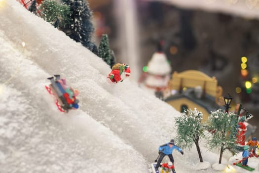 Santa Claus is skiing in the snow Winter scene from ceramic figures