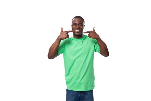 young positive 30 year old American guy dressed casually in a basic t-shirt and jeans.