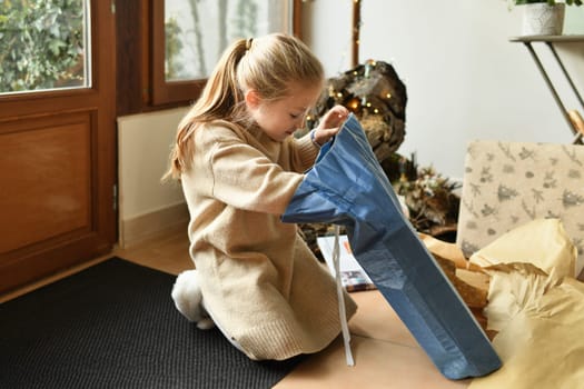 A child is surprised with a christmas present