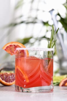 Red Sicilian Orange Paloma Cocktail of tequila, fresh lime and rosemary with red Sicilian orange juice. This cocktail is full of bright citrus aromas and herbs. Indulge your palate with an excellent drink.