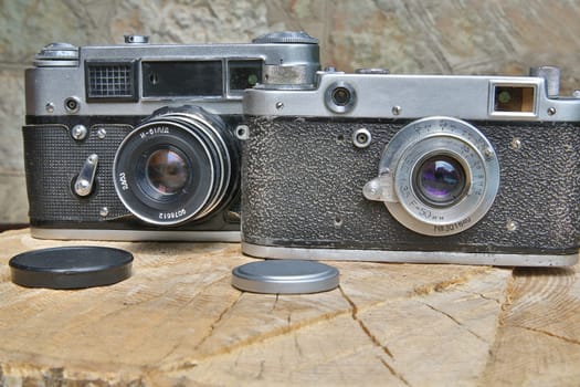Two old fashioned cameras are in good shape