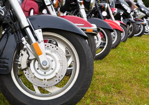 Different kind of bikes wheels are in line