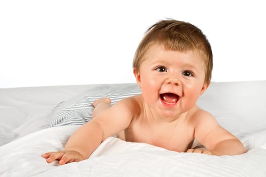 An adorable, laughing baby looking at camera