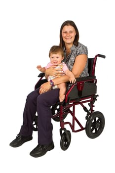 A smiling girl with a baby  in a wheelchair isolated on white background