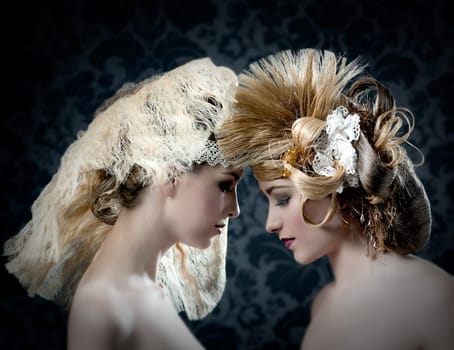 Hairdressing and makeup fashion two woman on dark background