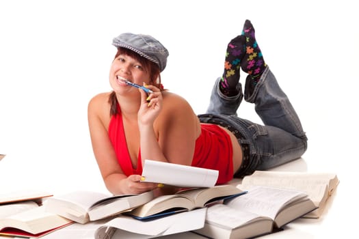 College student girl studying laying on the floor