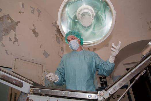 Surgeon making some fun before coming difficult surgery