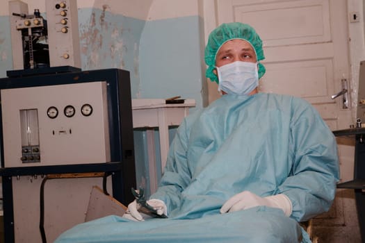 Surgeon take strange tool before coming difficult surgery